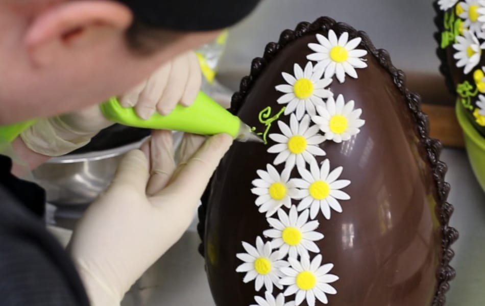 Decorating an egg in the Atelier