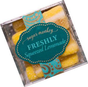 Sour lemon gourmet candy packaged in a clear cube